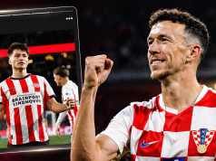 Ivan Perišić slavi pogodak u dresu Hrvatske dok se u pozadini vidi kadar s mladim igračem PSV-a Esmirom Bajraktarevićem