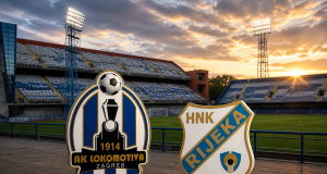 Grbovi NK Lokomotiva Zagreb i HNK Rijeka ispred stadiona Maksimir u Zagrebu s travnjakom u pozadini